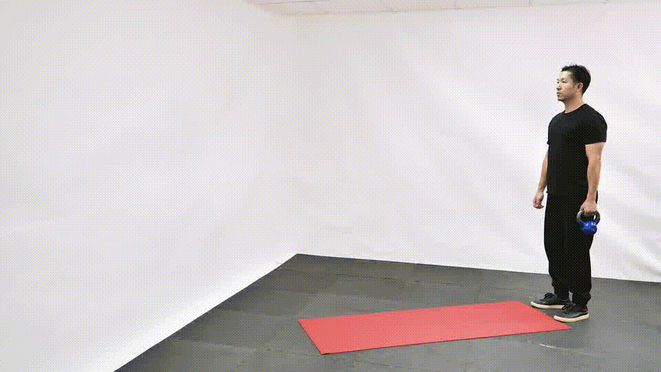 Kettlebell suitcase carry demonstration