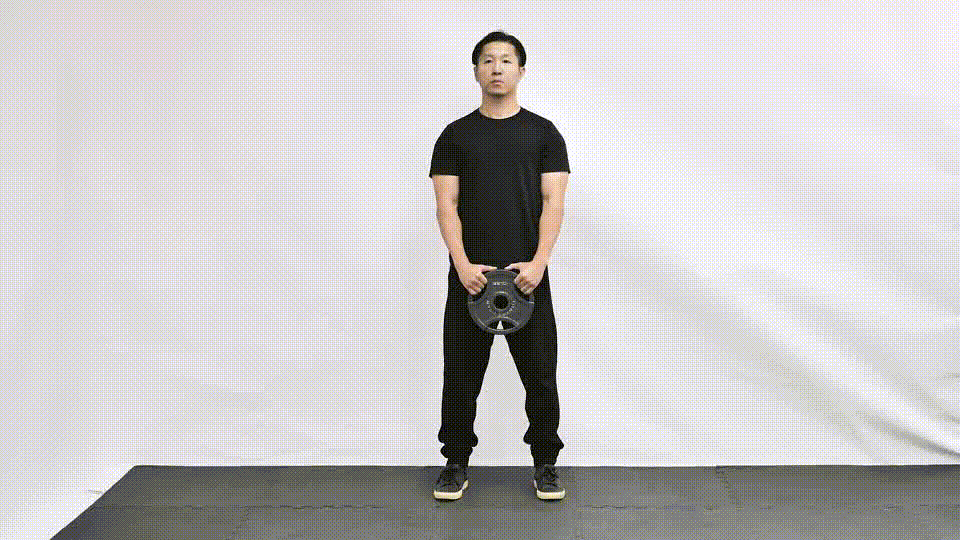 Wall sit demonstration with optional plate